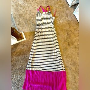 Navy and cream maxi dress with fuschia straps and bottom.